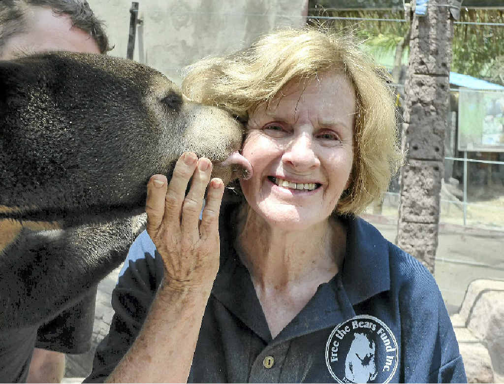 Mary Hutton gets a kiss from one of her beloved bears. Mary Hutton gets a kiss from one of her beloved bears.